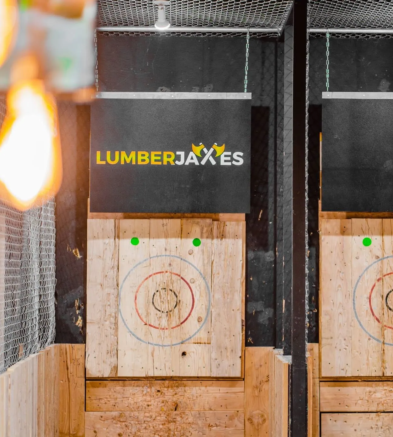Axe lanes lit up at Playground Dropout