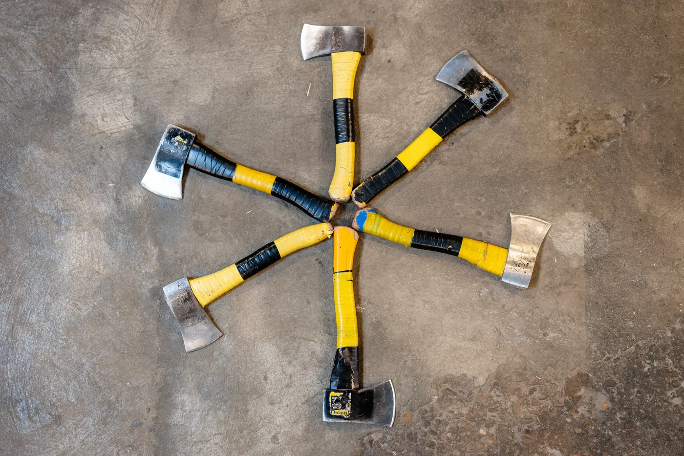 Throwing axes arranged in a starburst