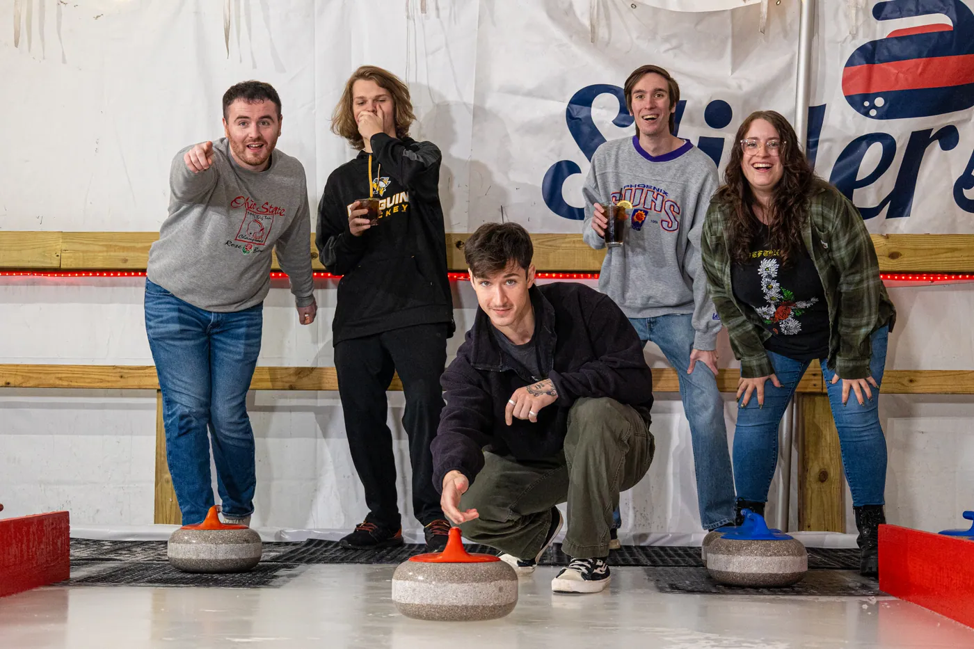 A group competing on the curling lanes